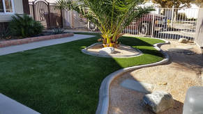 Drought tolerant front yard with artificial turf in Lancaster