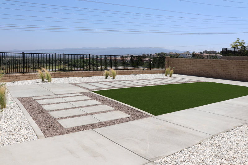 Concrete, Faux Grass, Landscape in a new Santa Clarita home.