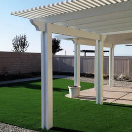 Combo patio cover with posts set in synthetic lawn